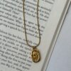 Vintage Charm Pendant Necklace